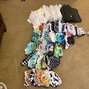46Cloth diapers 53 inserts 16 of the 53 are gray